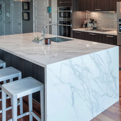 Olive Mill: Neolith Calacatta Countertop with Waterfall Edge